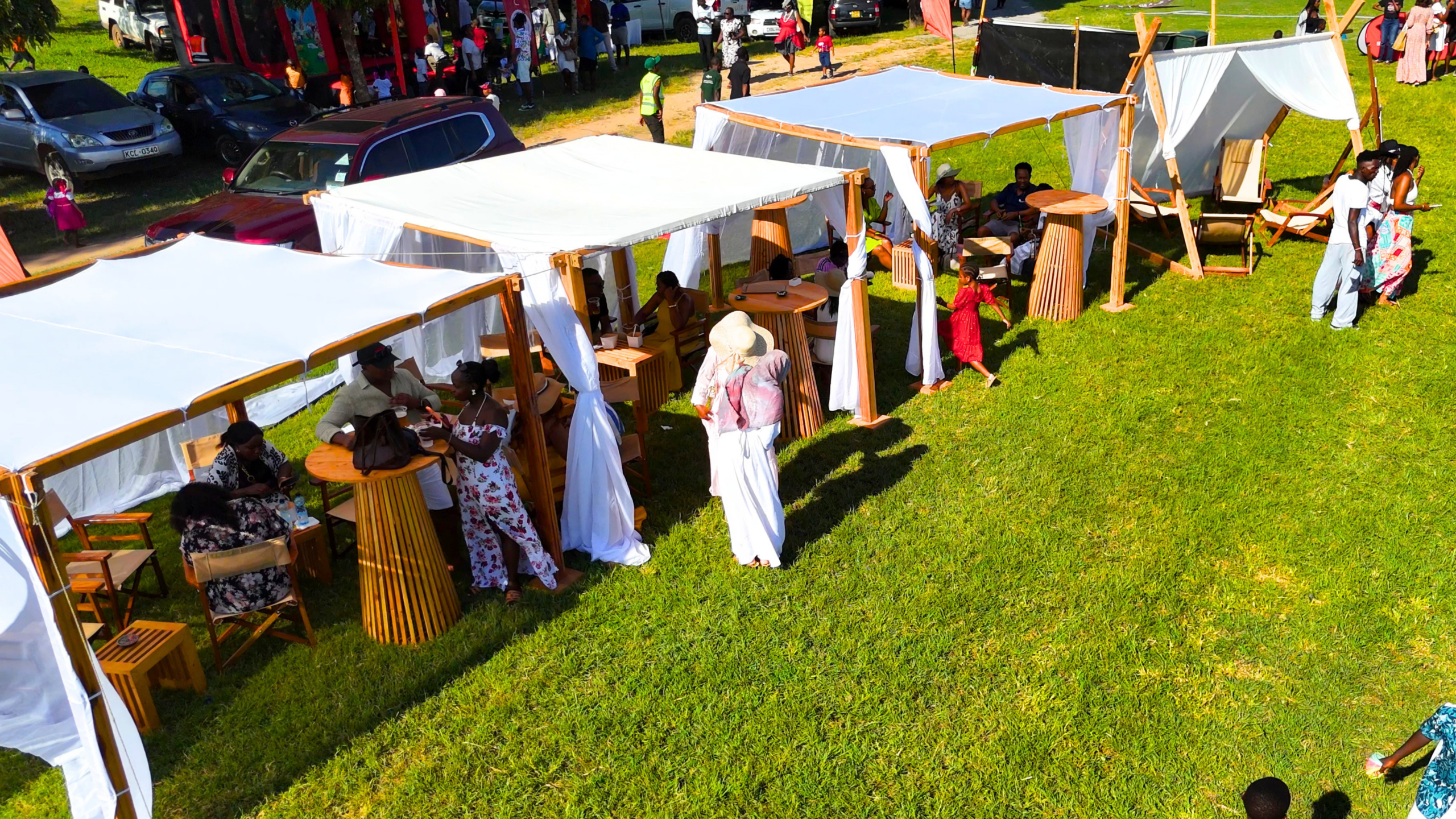 Guests relaxing beneath Eco Friendly Events canopies at the Diani Goat Derby